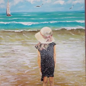 113 Girl with white hat at the sea